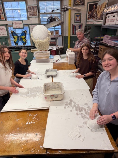 7th grade artists are hard at work creating traditional Japanese Kabuki-inspired masks using plaster craft 🎭 Students begin by forming the mask base, then design patterns and hand-paint each piece. Inspired by Kabuki theater—an art form over 400 years old—this project explores Kumadori, the bold makeup style used to reveal a character’s personality, much like a mask.