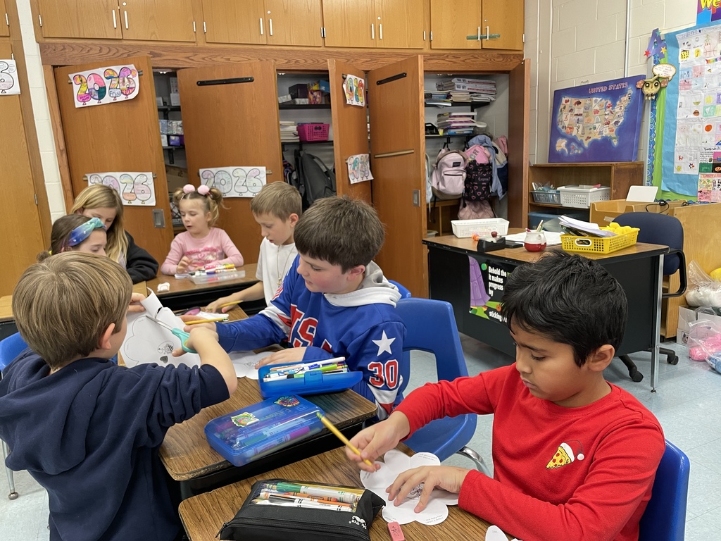 Students writing kind notes to people they love.