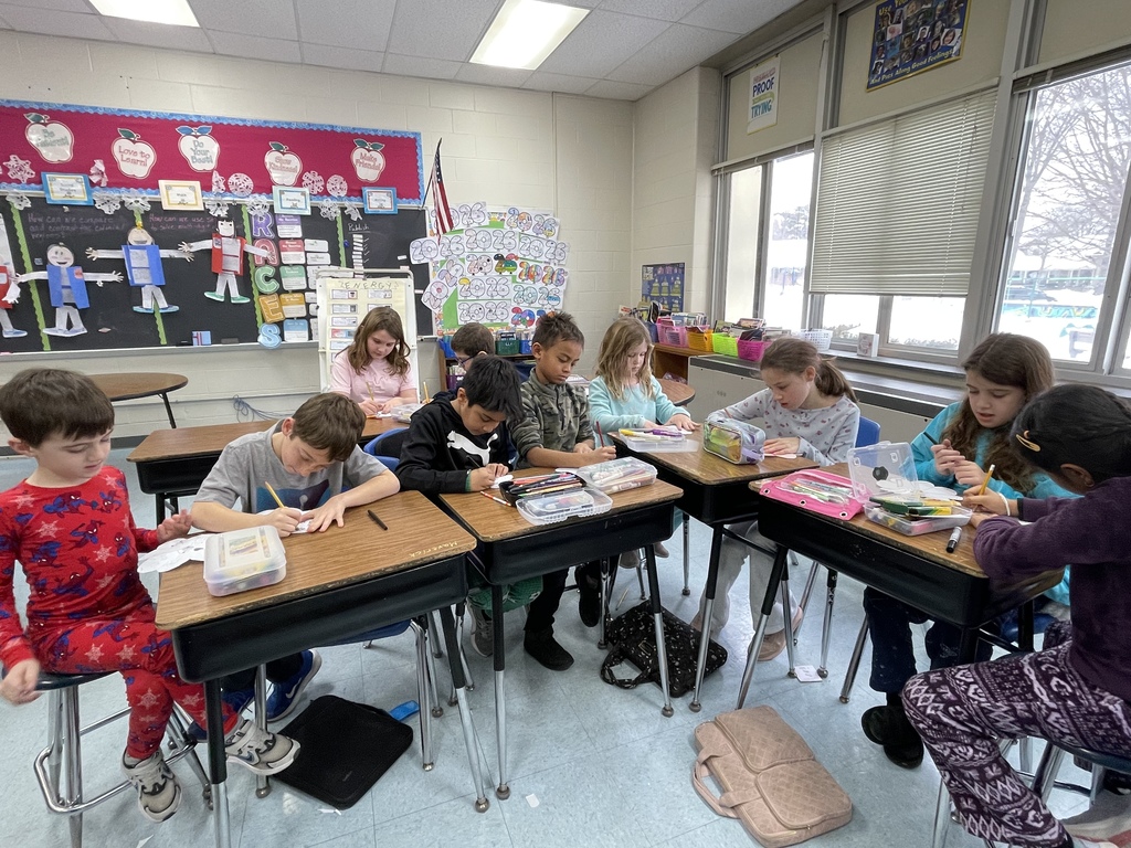 Students writing kind notes to people they love.