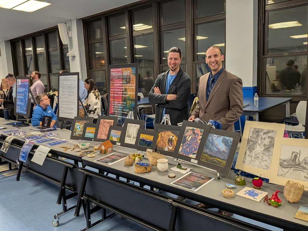 Visual Arts teachers presenting current students' works.