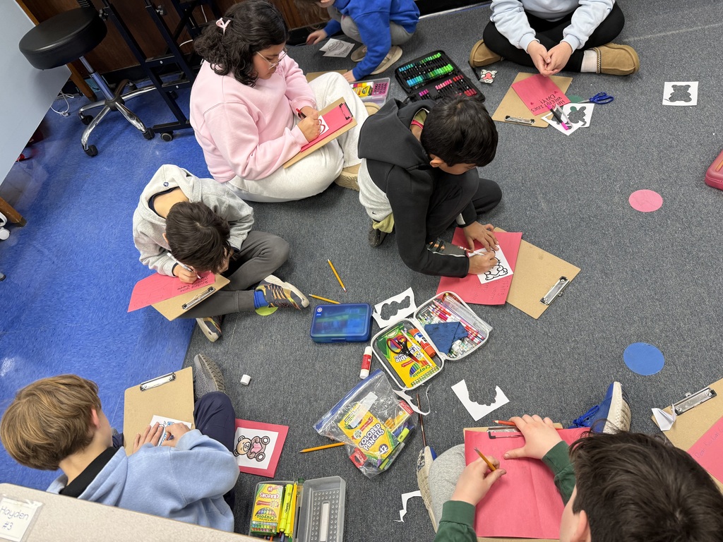 Students creating cards.