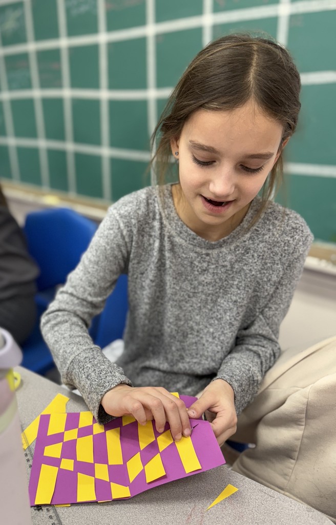student working on Op art project