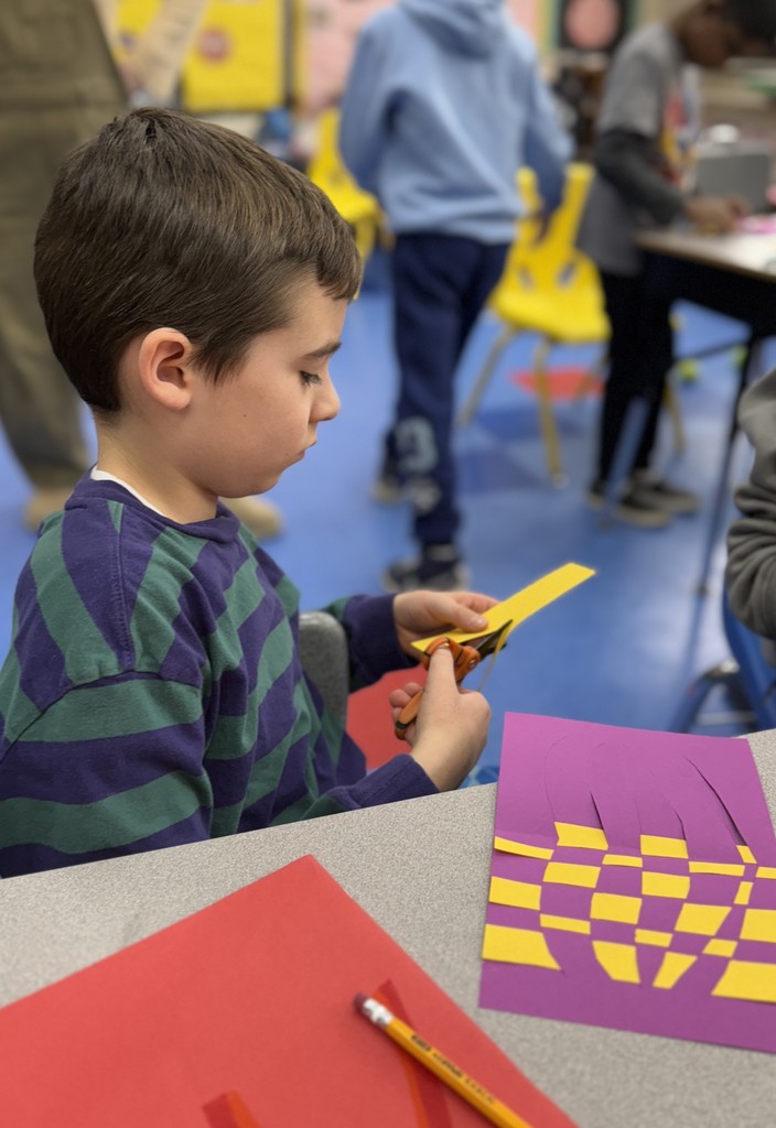 student working on Op art project