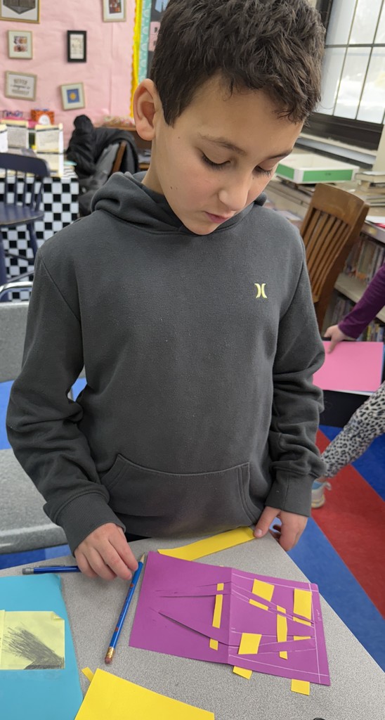 student working on Op art project