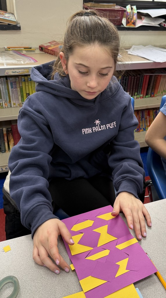 student working on Op art project