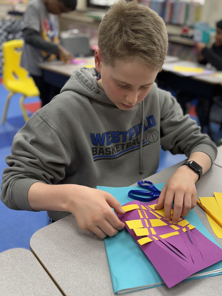 student working on Op art project
