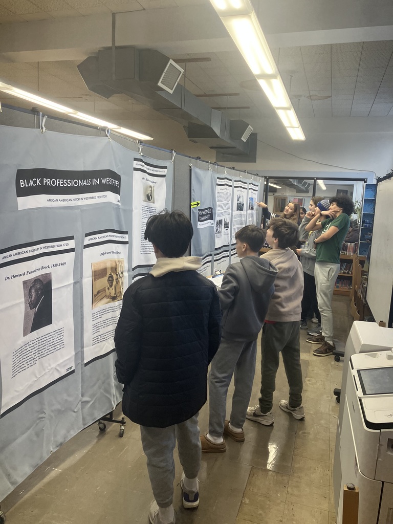 students looking at exhibits