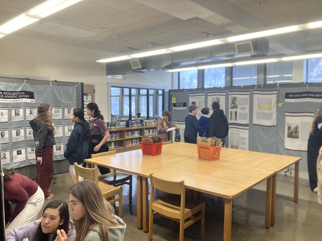 students looking at exhibits