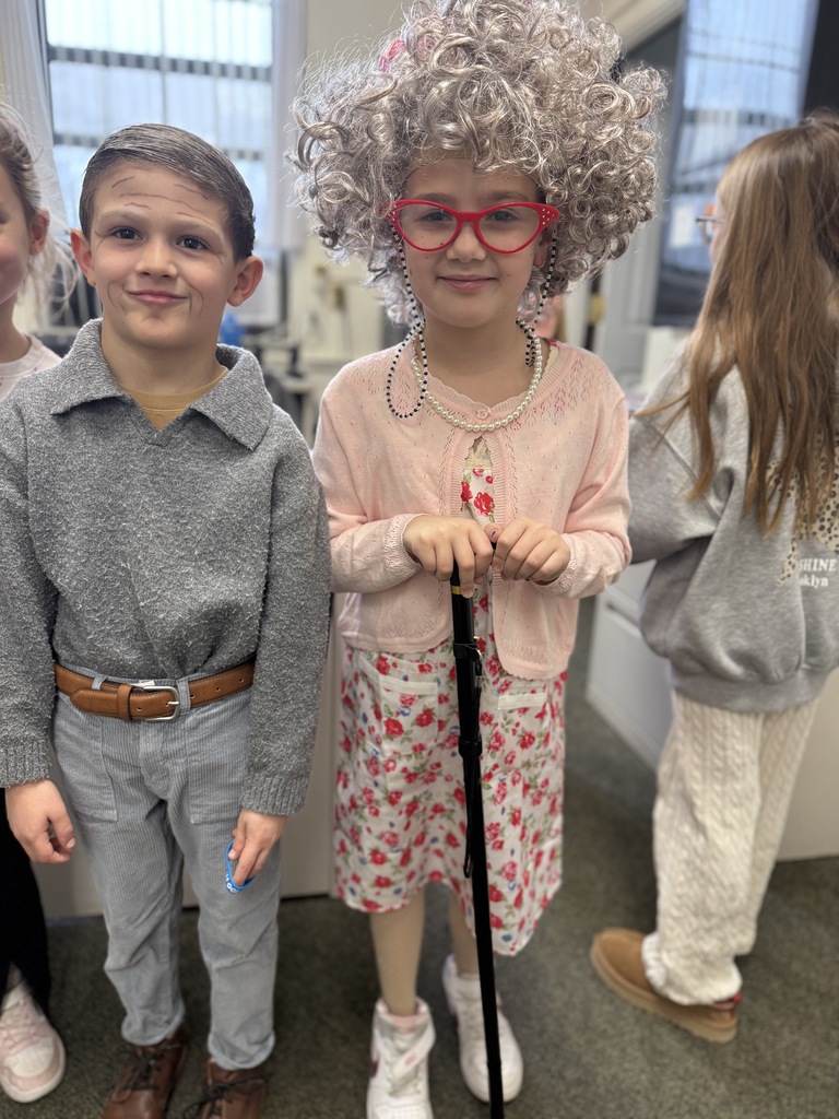 students celebrating 100th day