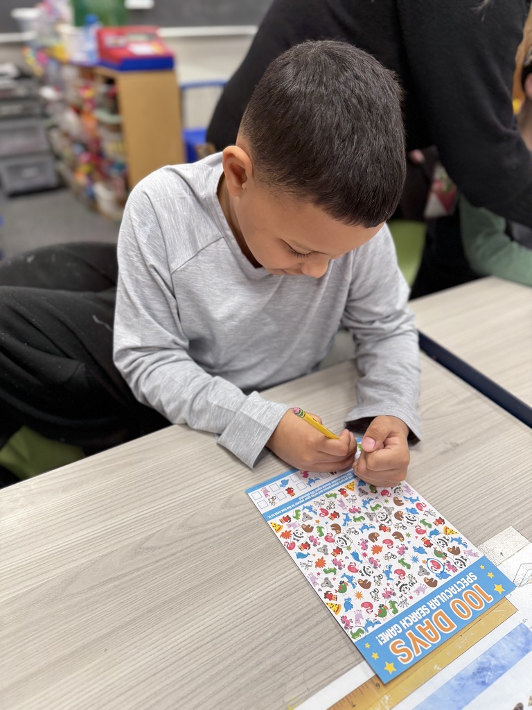 student working on 100th day activity