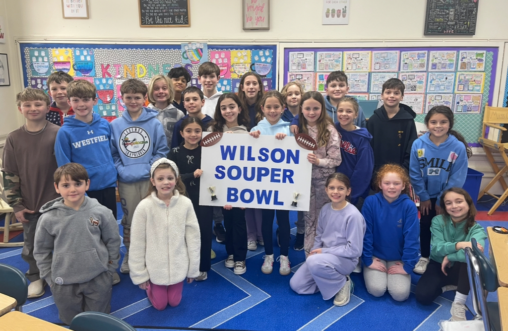winning class holding Wilson Souper  Bowl sign