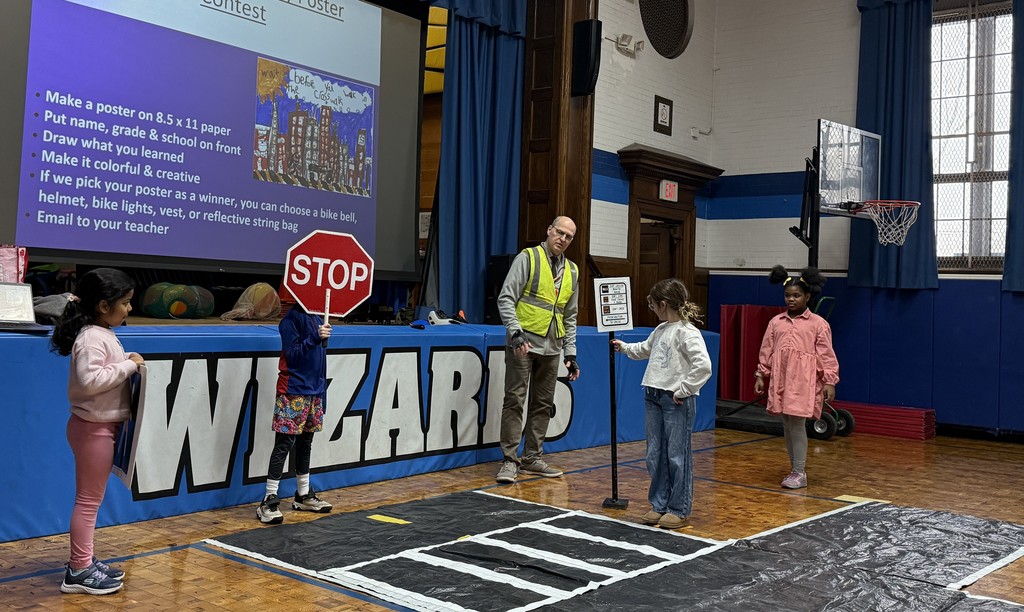 Wilson second graders practicing  pedestrian safety skills