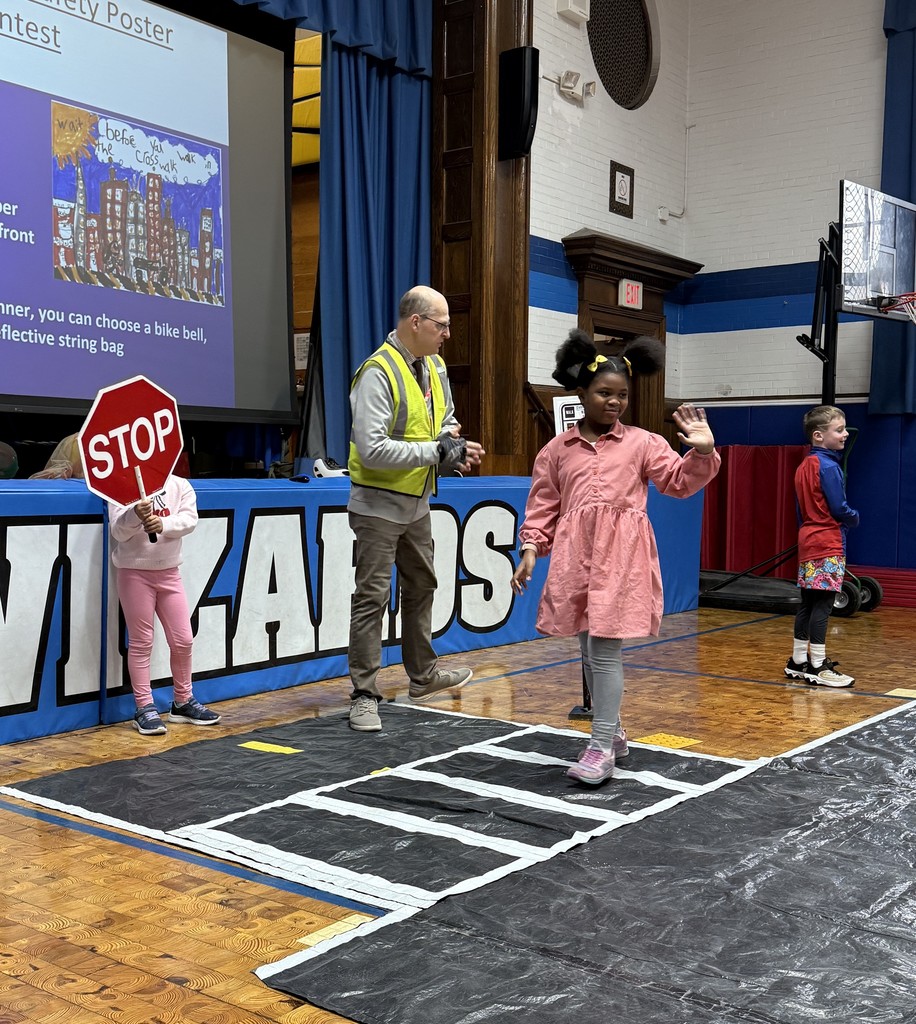 Wilson second graders practicing  pedestrian safety skills