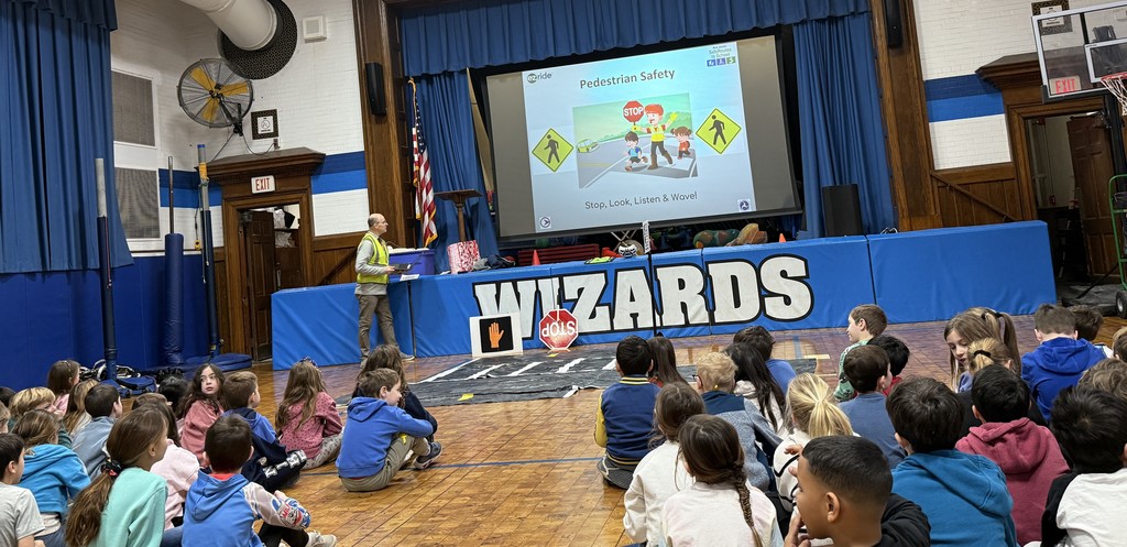 Wilson second graders listening to pedestrian safety presentation