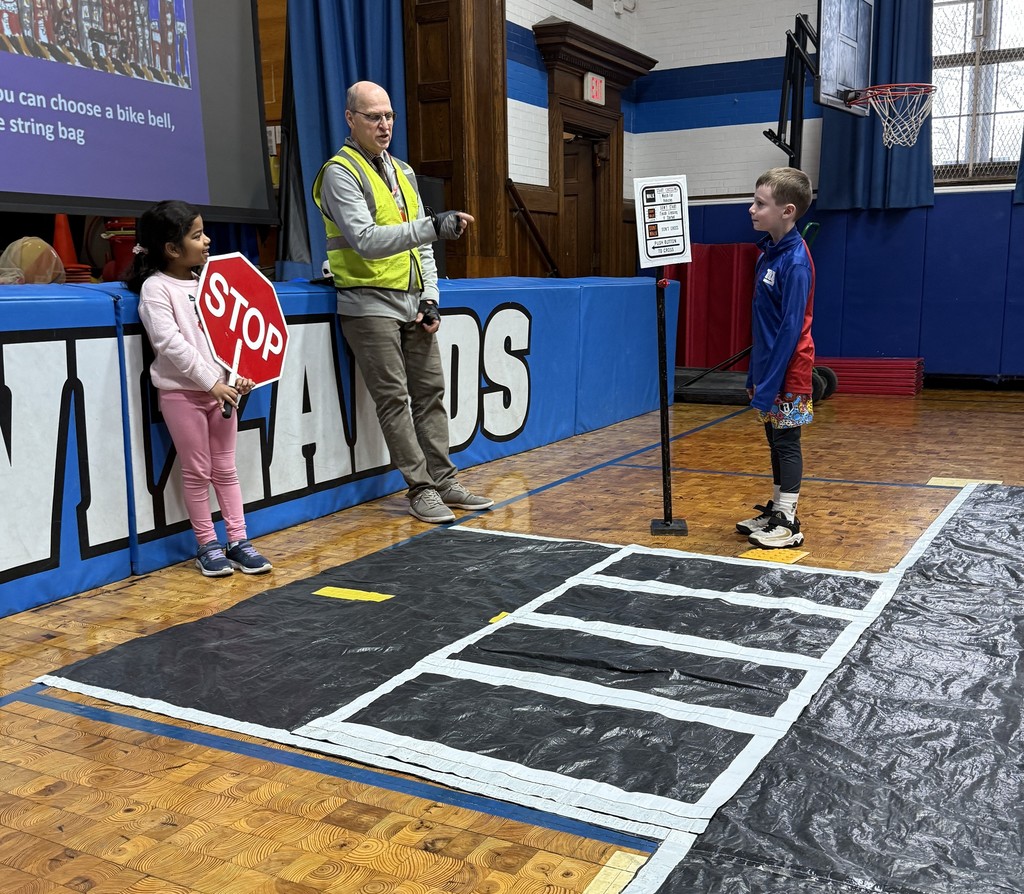 Wilson second graders practicing  pedestrian safety skills