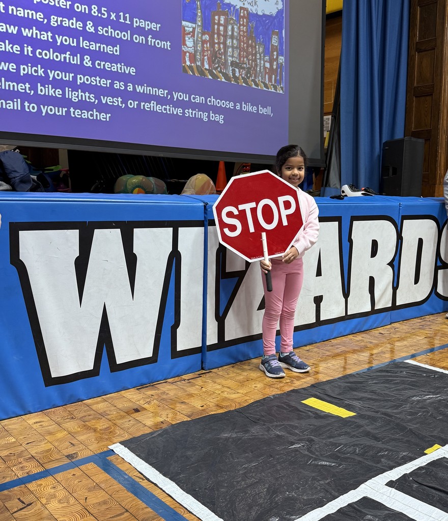 Wilson second graders holding stop sign
