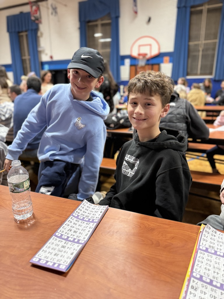 students playing BINGO at PTO Family Game Night