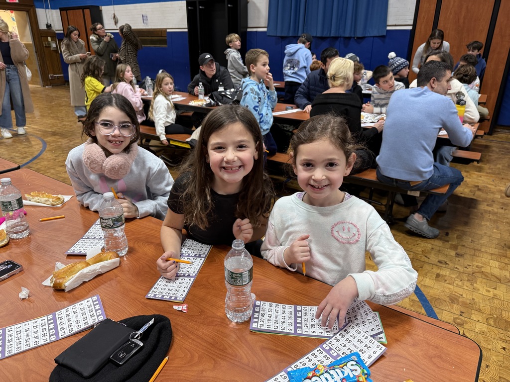 students playing BINGO at PTO Family Game Night
