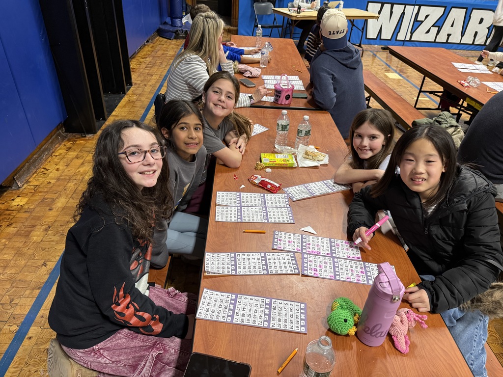 students playing BINGO at PTO Family Game Night