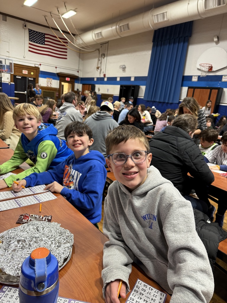 students playing BINGO at PTO Family Game Night