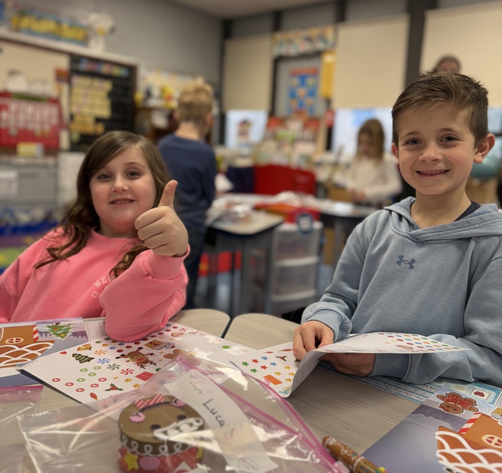 students working on gingerbread craft