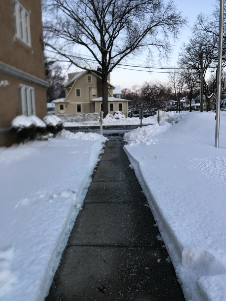 sidewalk cleared to the snow