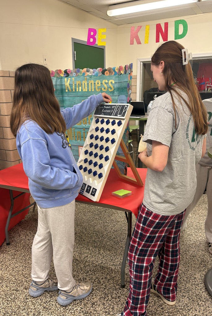 Student participating in kindness game