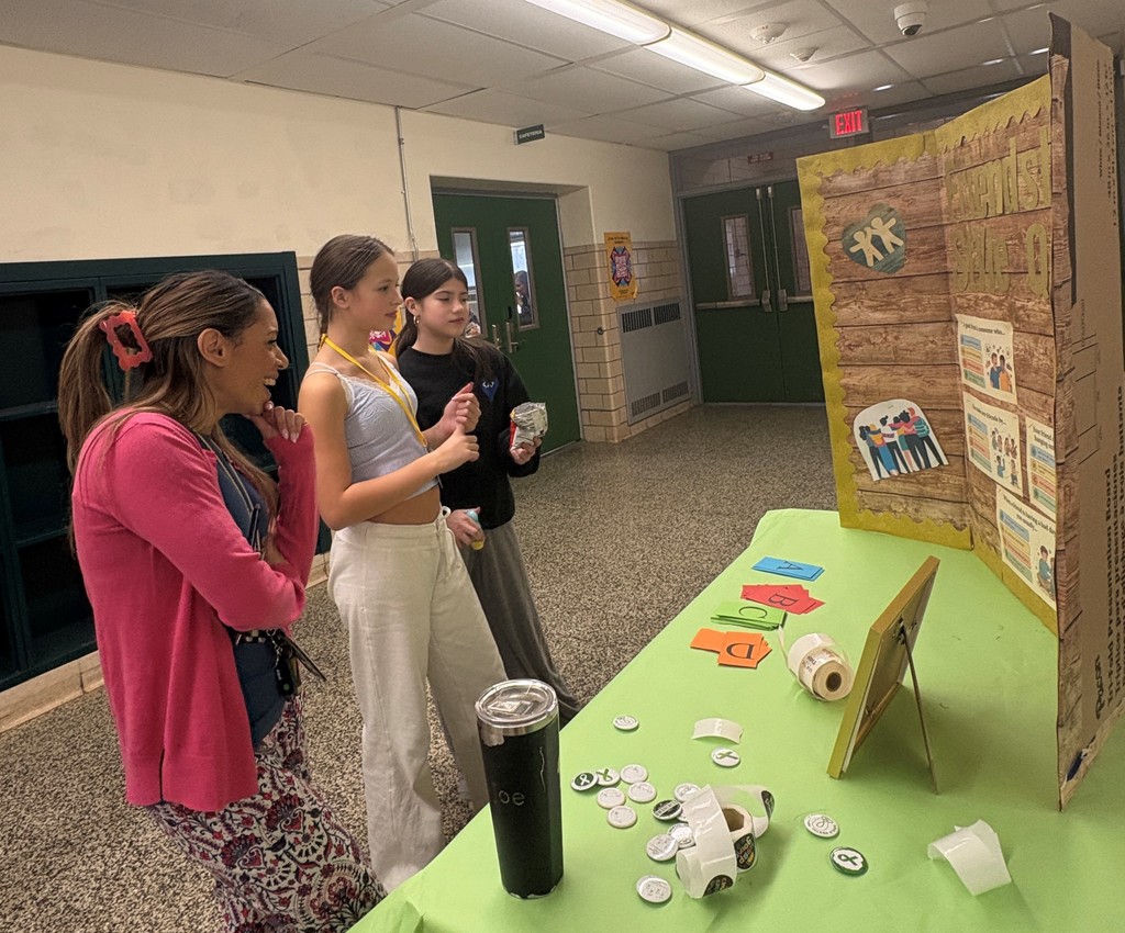 Students and teacher taking friendship style quiz 