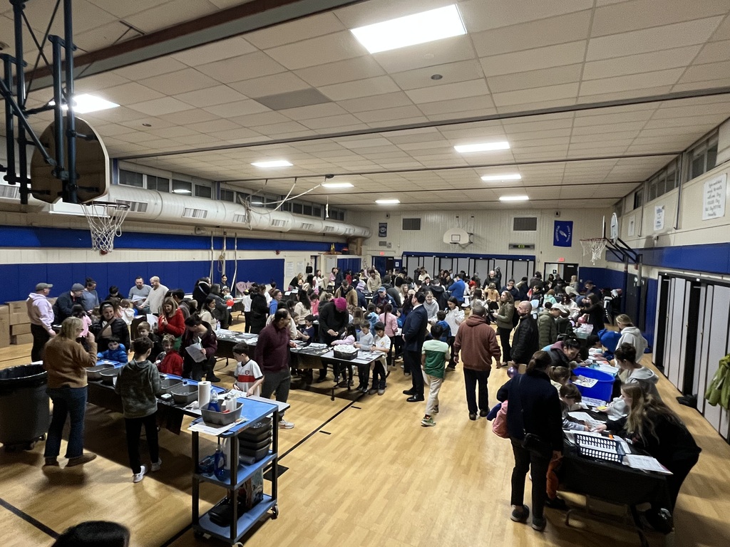 Students enjoying the many stations of the evening