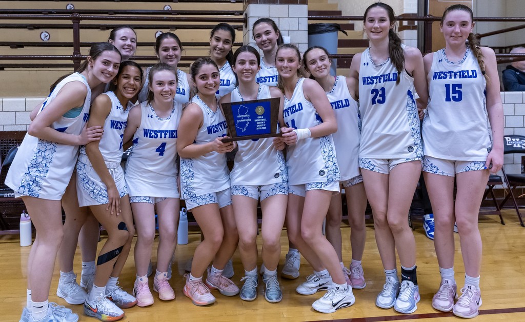 WHS Girls Varsity Basketball team celebration