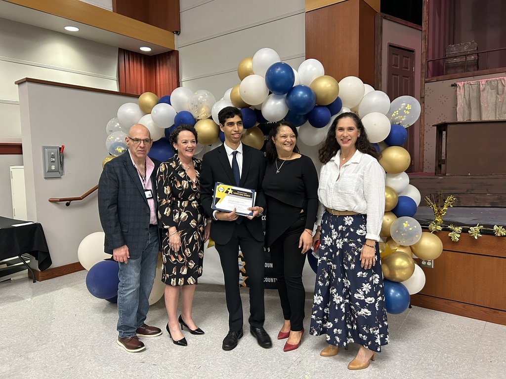 WHS Unsung Hero Award Recipient with WHS Principal, his mother and organization reps