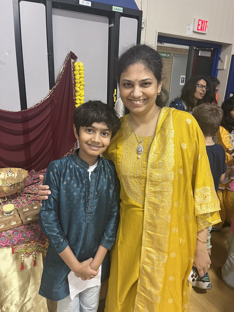 Student and parent sharing the traditions of India.