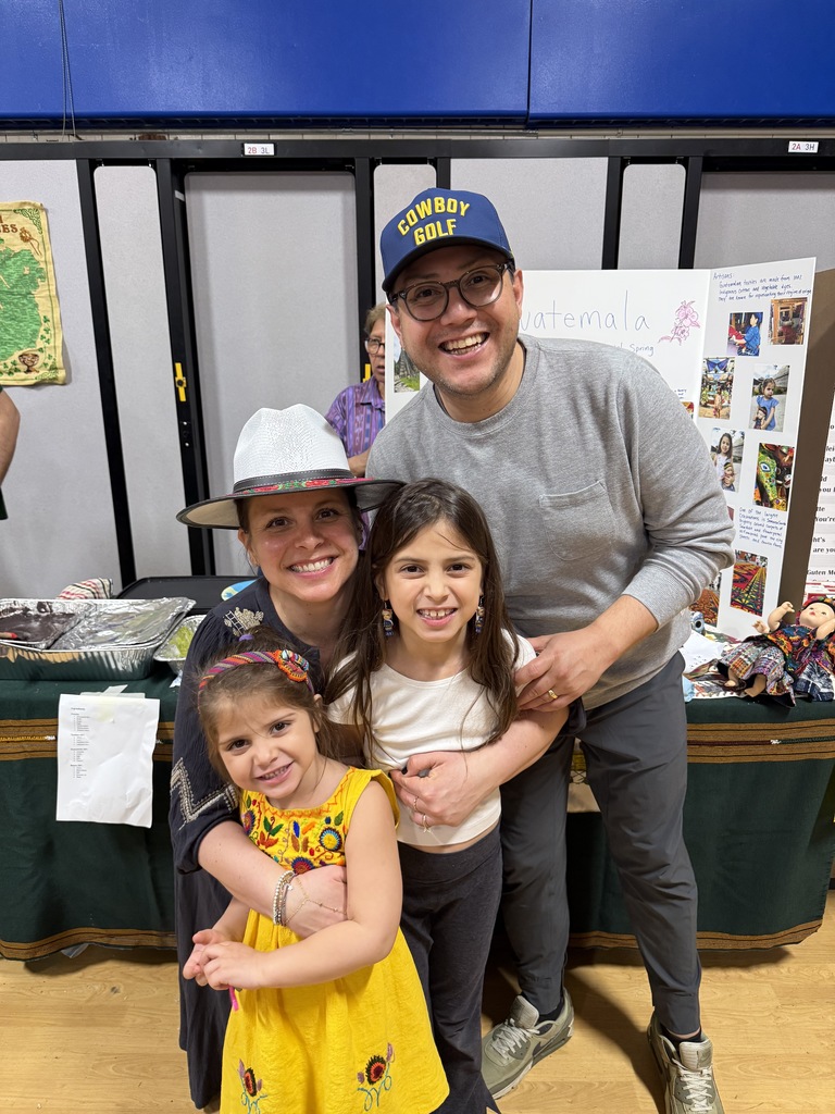 A family enjoying their evening and proud to share about Guatemala. 