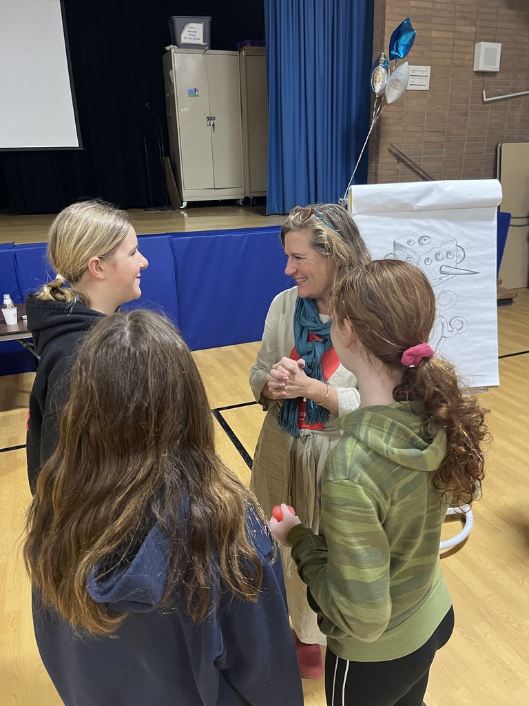 Author chats with some students.