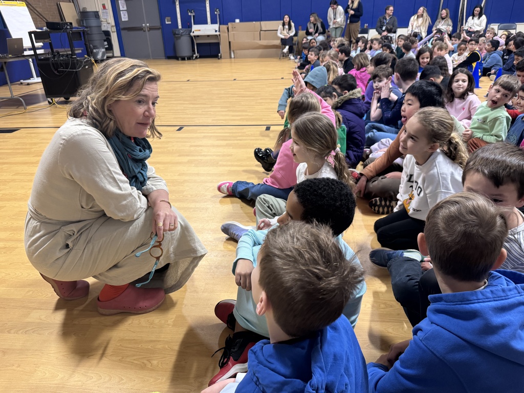 Author chats with students.