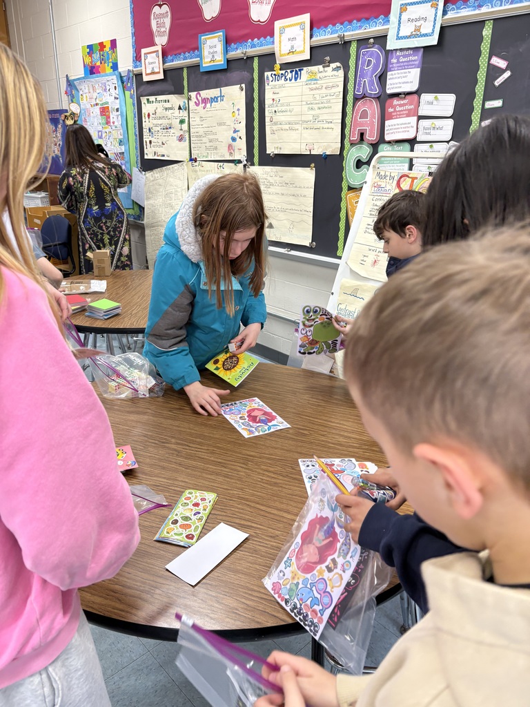 Students decorating bags.