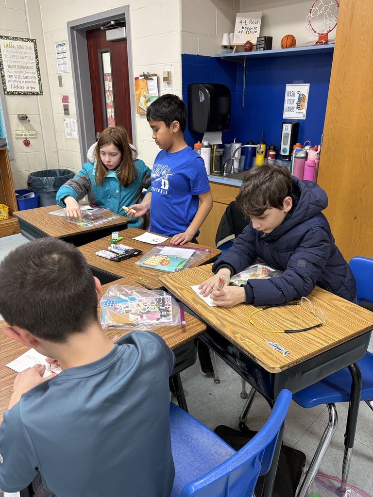 Students decorating bags.