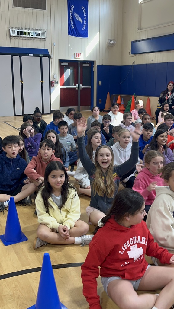 Students enjoying the performance.