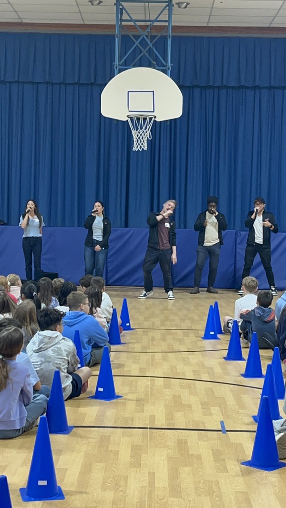 The singers are dancing along.