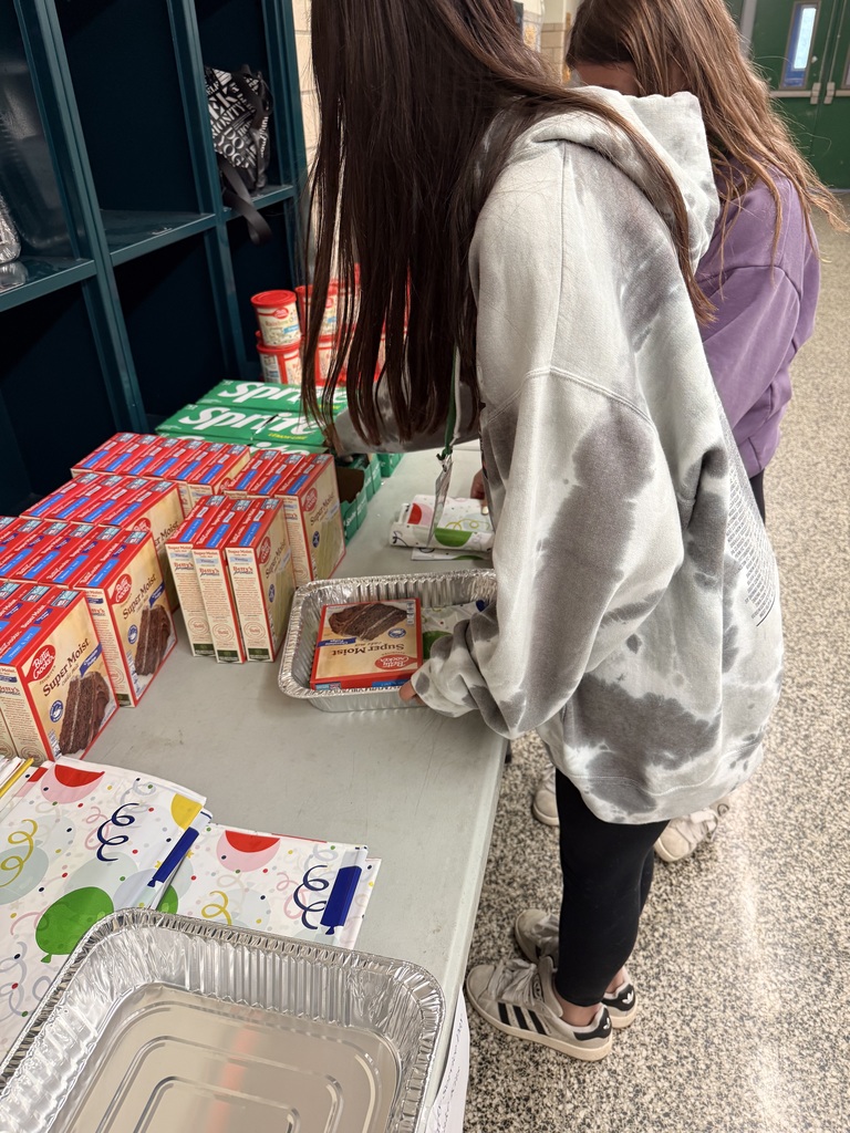 students putting together kits