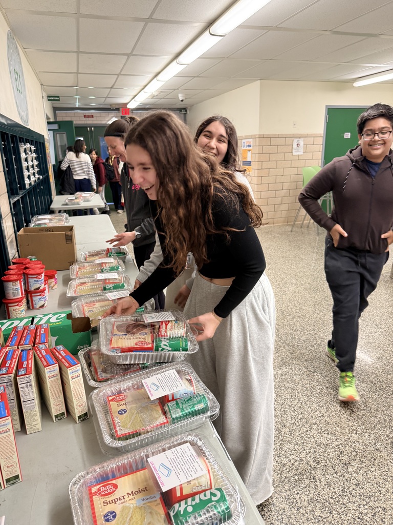 students putting together kits
