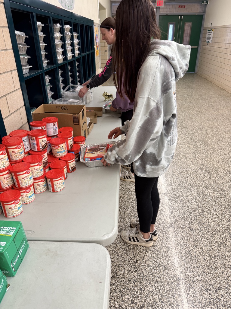 students putting together kits