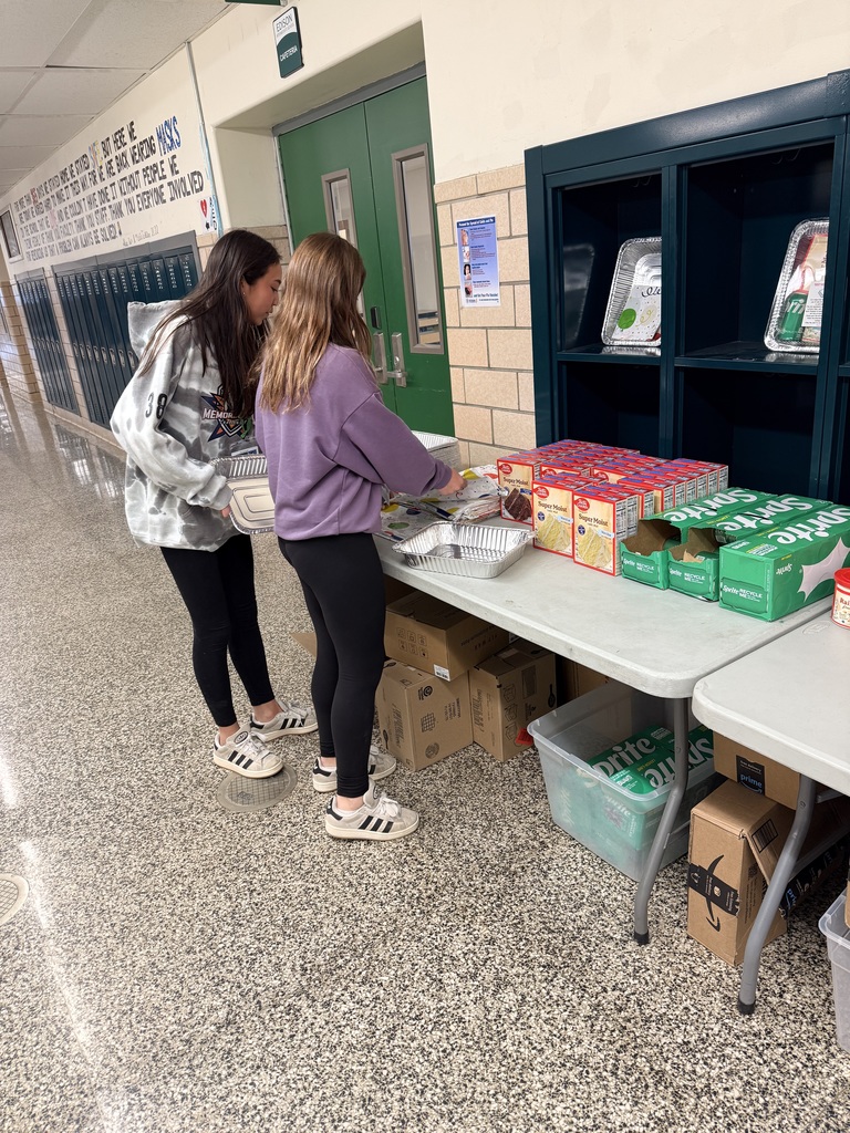students putting together kits