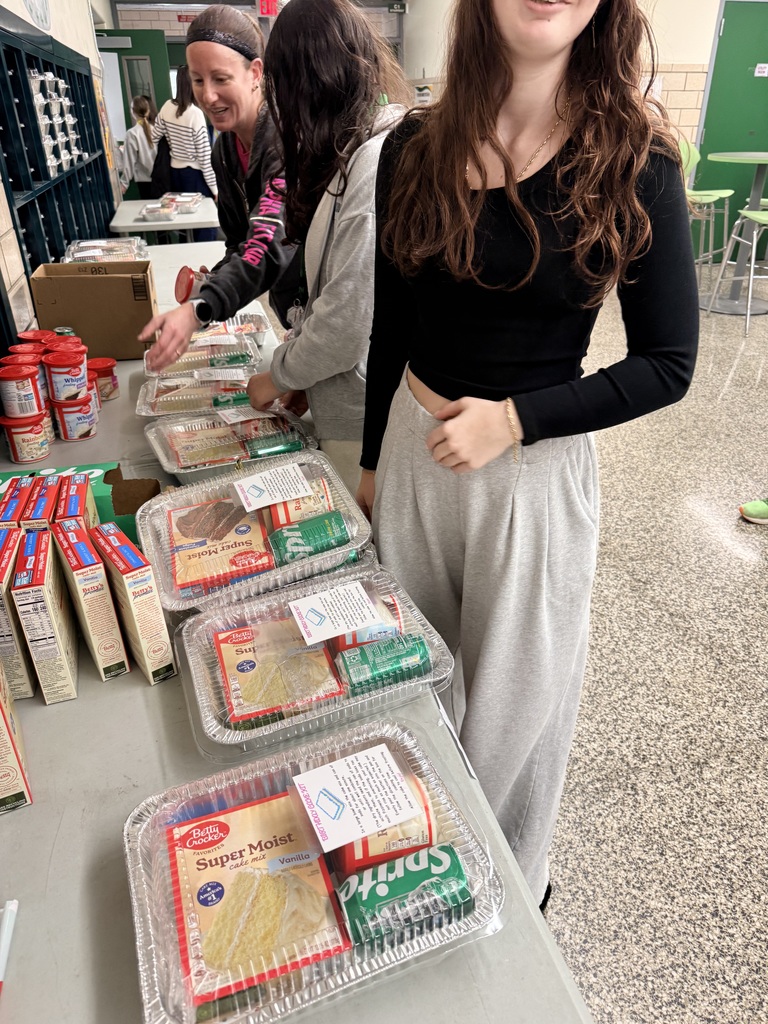 students putting together kits