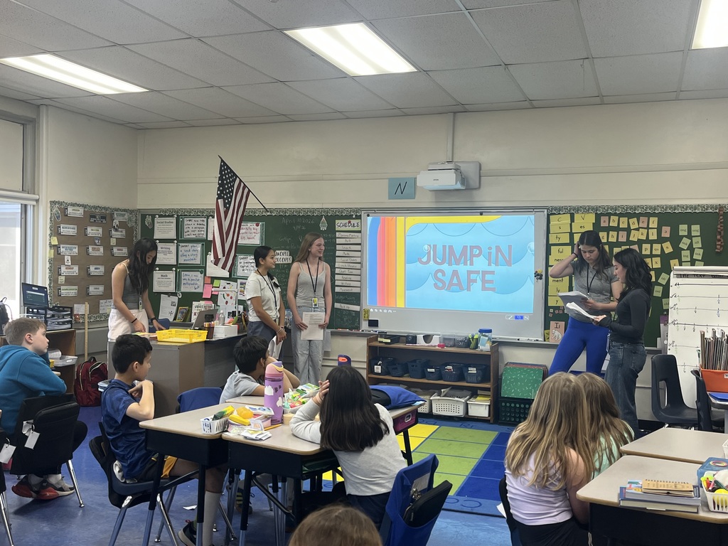 5 WHS presenters talking with our 3rd graders.