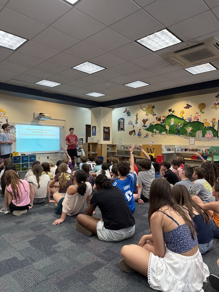 students listening to the No Place for Hate high school students presenting