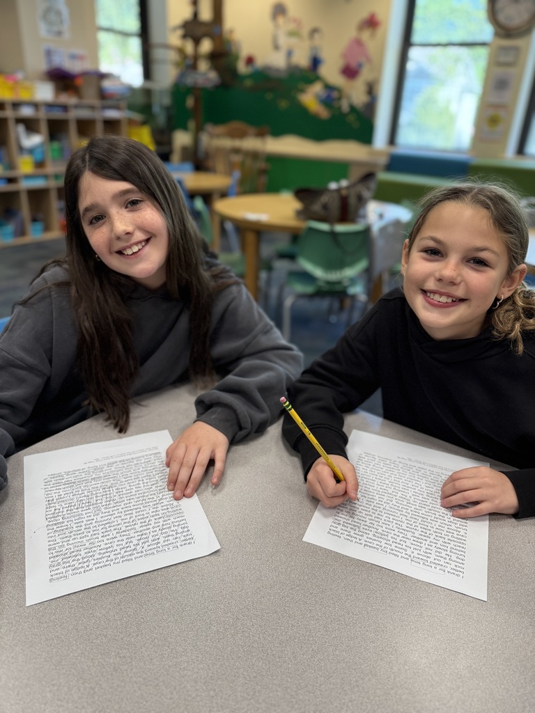 students creating a Black-Out poem