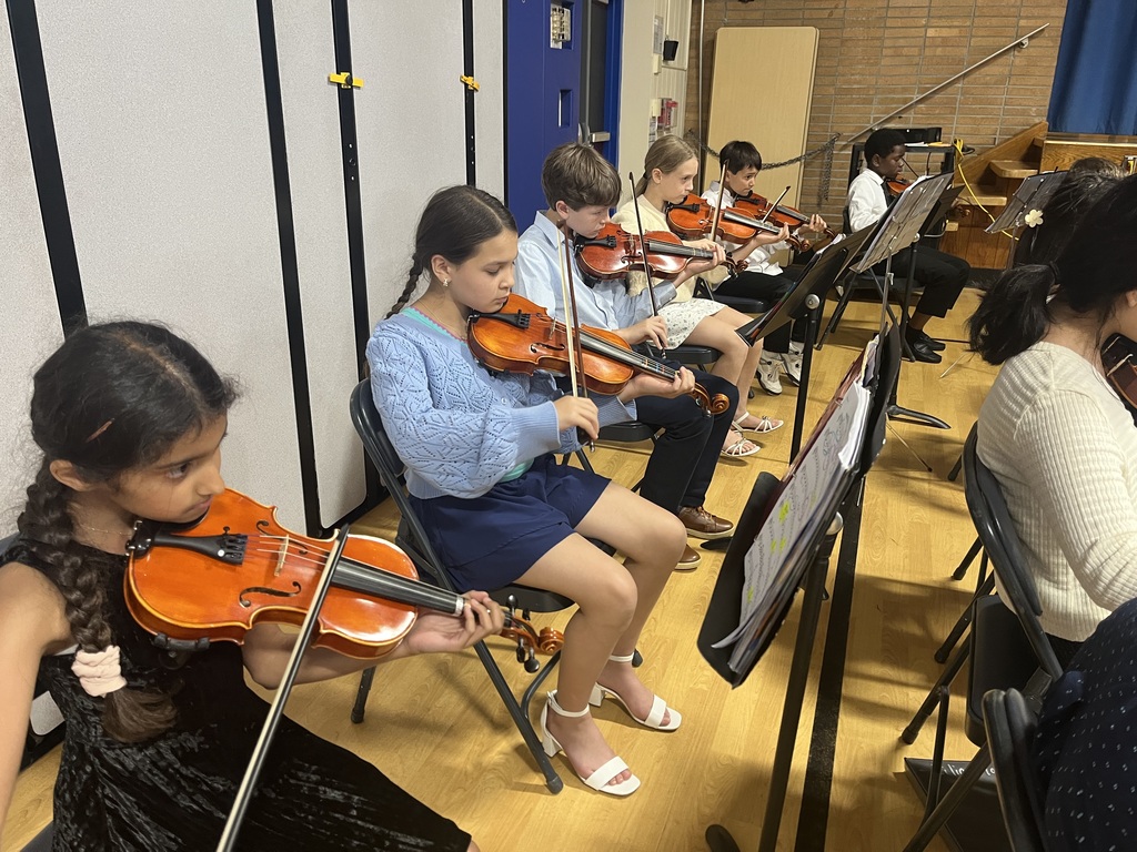 Orchestra students performing