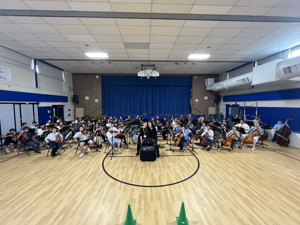 Mrs. Naylor, her daugther and our 4th and 5th grade orchestra