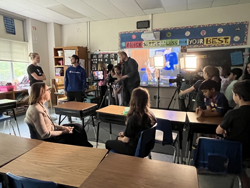 Ms. Lavin and students wait for the interview to begin.